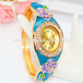 Belle mode Vintage Rhinestone Flower Bangle Watch pour les femmes B080